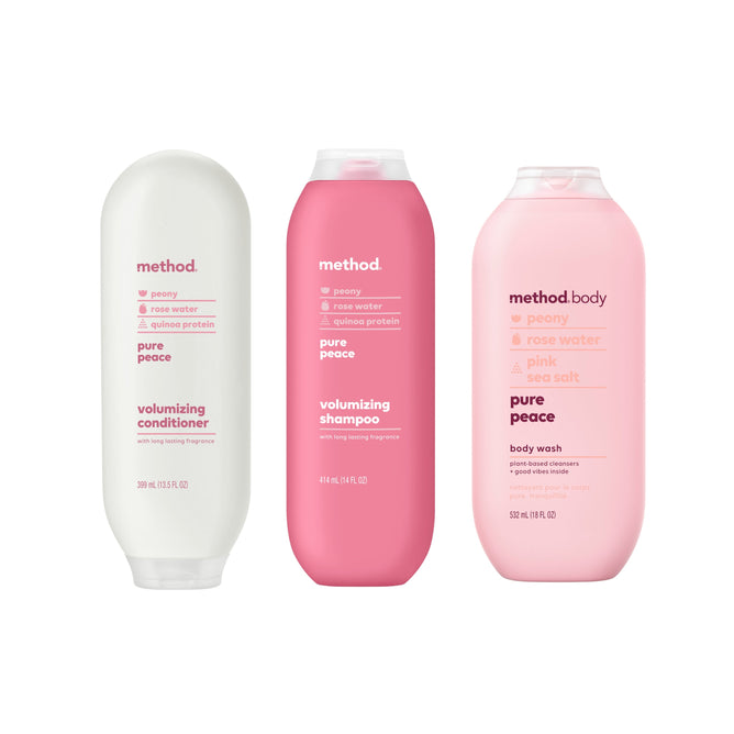 Three bottles of method bath products: the Shampoo, Conditioner & Body Wash Starter Set - Pure Peace, featuring minimalist labels in pink, white, and light pink bottles.