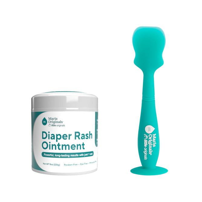 The Marie Originals Diaper Rash Ointment + free gift includes a 226g paraben-free ointment with a teal ergonomic applicator and Hydroil Shield technology, featuring a white design with teal labeling for powerful, long-lasting results.