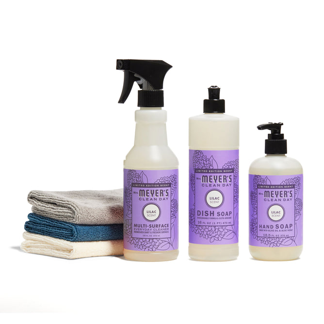The Freshen Up for Spring Cleaning Set by Mrs. Meyers includes a lavender multi-surface cleaner, dish soap, and hand soap, paired with folded white and blue microfiber cloths—the ideal combo for spring cleaning.