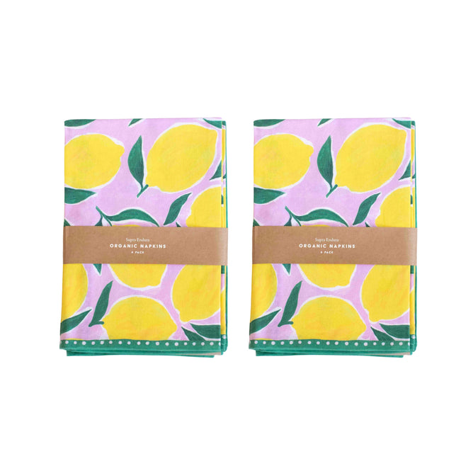 Two sets of Supra Endura Limited Edition Organic Cotton Napkins beautifully present a lemon design in yellow and green on pink. Each set is wrapped with a brown paper band labeled Organic Napkins. A free gift is included.