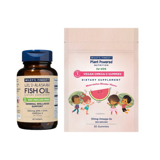 Two Wileys Finest dietary supplements: a bottle of Wild Alaskan Fish Oil - Easy Swallow Minis with EPA and DHA for wellness, and a packet of watermelon vegan Omega-3 gummies for kids, featuring playful cartoon children on the packaging.