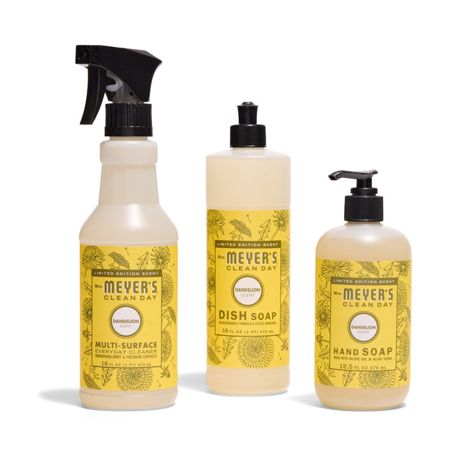 The Mrs. Meyers Sun & Suds Set - Dandelion features three yellow-labeled products—a Multi-Surface Cleaner spray, Dish Soap bottle, and Hand Soap pump—displayed side by side on a white background.