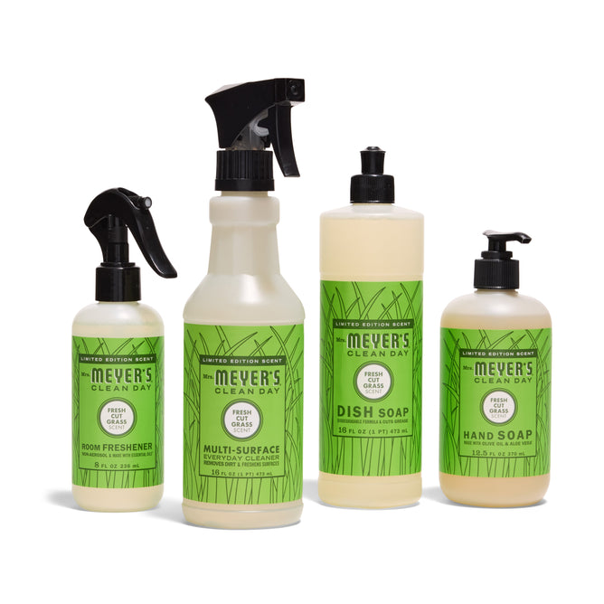 The Mrs. Meyer’s Endless Summer Cleaning Set - Fresh Cut Grass includes four green-labeled products—room freshener, multi-surface cleaner, dish soap, and hand soap—all in the refreshing Fresh Cut Grass scent.