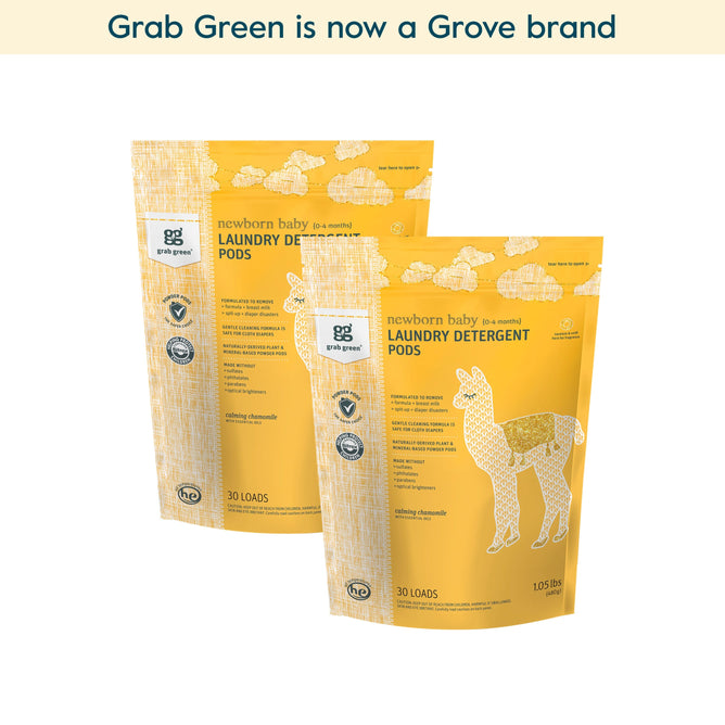 Two yellow grab green Newborn Laundry Detergent Pods 2-Packs in Calming Chamomile, with a llama illustration and certifications, sit below a grab green is now a Grove brand banner. Perfect for stubborn newborn laundry stains. (Coming Soon!).