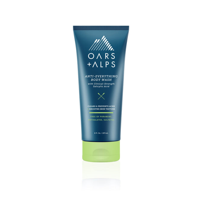 A blue and green 8 fl oz tube of Oars + Alps Anti-Everything Body Wash with Salicylic Acid, designed to clear and prevent acne while smoothing skin texture—ideal for bacne treatment. The tube stands upright on a white background.