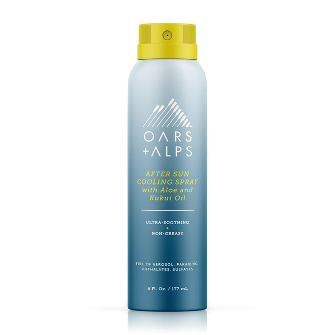 A blue and yellow spray can of Oars + Alps Aloe Cooling Spray with Aloe Vera, Kukui Oil, and Niacinamide. The label highlights its ultra-soothing, non-greasy formula thats paraben-, phthalate-, and sulfate-free.
