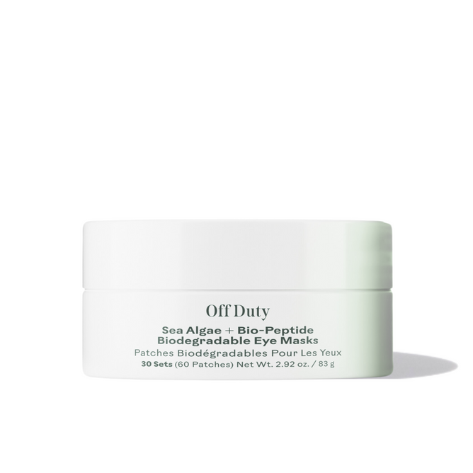 A white jar labeled Three Ships Off Duty Sea Algae + Bio-Peptide Smoothing Eye Masks, featuring details about these eye masks with Sea Algae Extract and vegan Bio-Peptides, set against a plain white background.