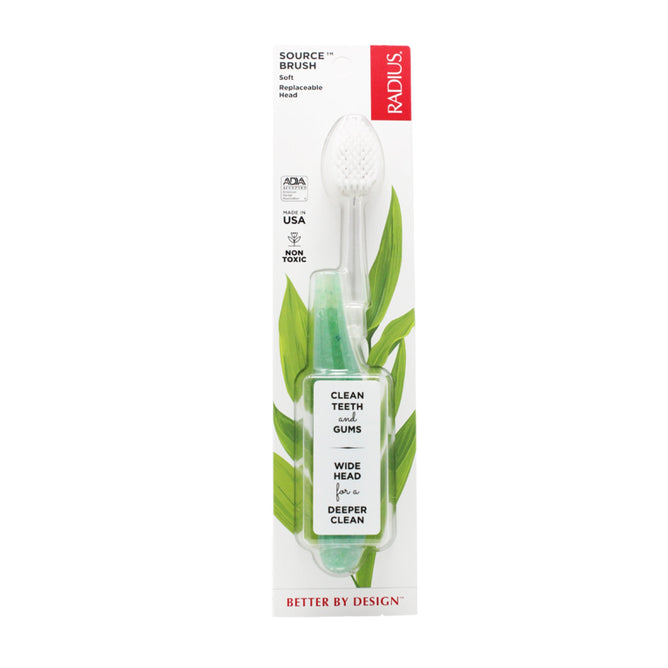 A Radius Source Toothbrush with Replaceable Head in its packaging, featuring an ergonomic white and green handle made from recycled materials. Highlights include Clean Teeth & Gums, Wide Head for Deeper Clean, and green leaves in the background.