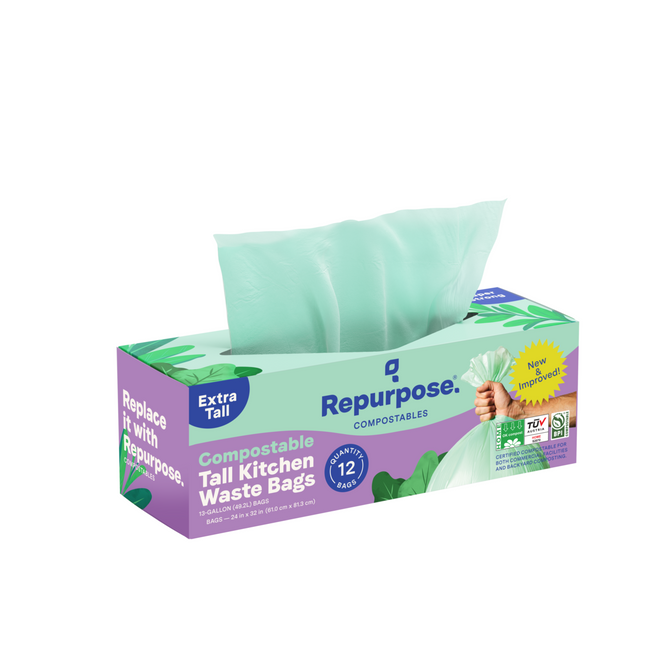A box of Repurpose Compostable Tall Kitchen Bags labeled Extra Tall contains 12 home-compostable light green bags. The eco-friendly packaging features a hand holding a tied bag.