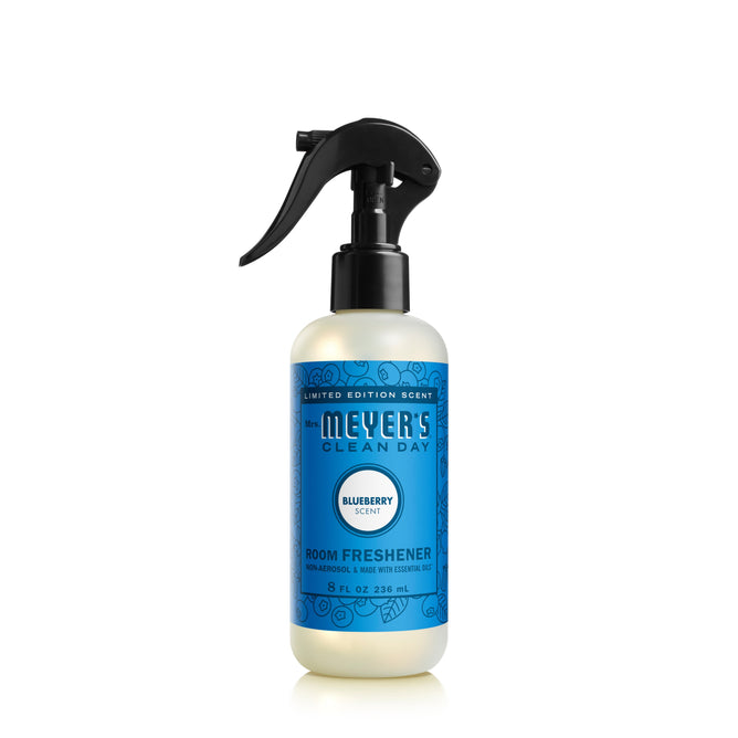 A limited edition 8 fl oz (236 ml) spray bottle of Mrs. Meyers Room Freshener featuring a delightful blueberry scent and a blue label with decorative patterns.