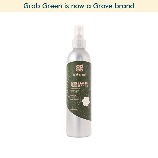 A silver spray bottle of grab green Room and Fabric Freshener - Gardenia (Coming Soon!) with a green label is shown. Made with essential oils to neutralize odors, this fabric freshener is now part of the Grove brand.
