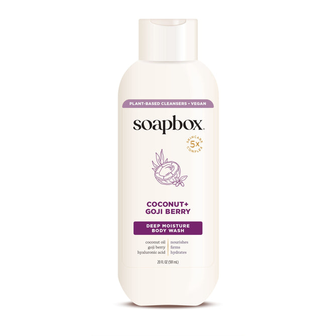 Soapboxs Coconut + Goji Berry Nourishing Body Wash, ideal for dry skin, offers 5x moisture with vegan, plant-based ingredients. This 24 fl oz (710 ml) body wash comes in a white bottle with purple and gold accents.