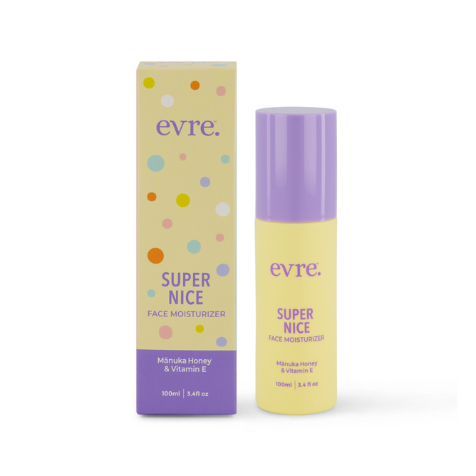 The image showcases a 100ml evre. face moisturizer called Super Nice Mānuka Honey & Vitamin E. The yellow bottle with a purple cap comes with a matching box featuring colorful dots.