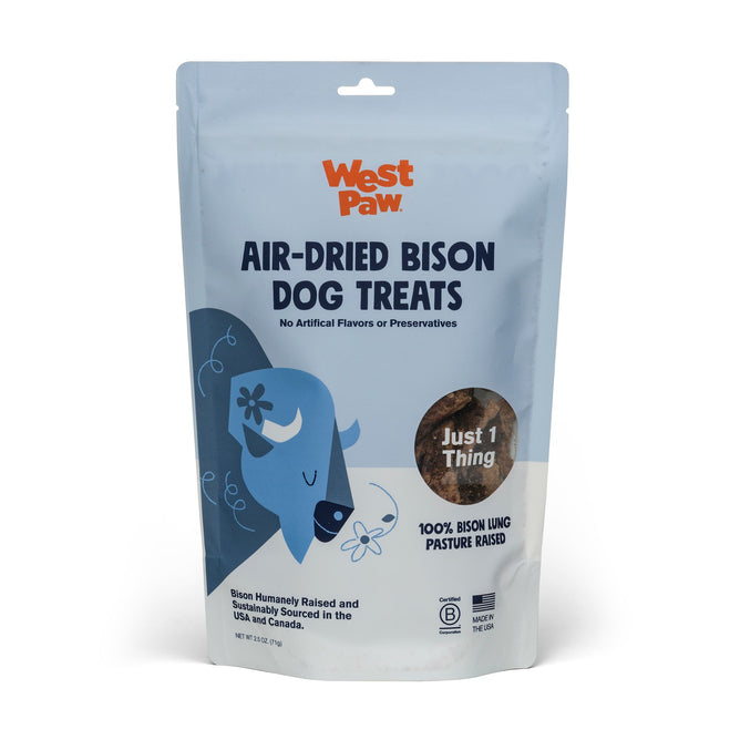 A blue and white West Paw bag displays cartoon bison art and a clear window revealing their Dog Treat - Air-Dried Bison Lung, High Protein Single Ingredient, made from 100% sustainably sourced bison lung.