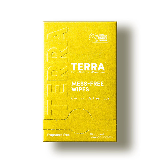 Yellow rectangular box of Terra Mess Free Multi-Purpose Wipes, individually wrapped and made from natural bamboo. Each eco-friendly, fragrance-free wipe is plastic free; 30 wipes per box for clean hands and a fresh face.