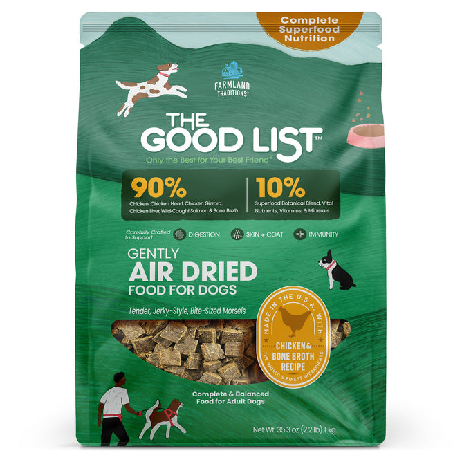 A green bag of The Good List by Farmland Traditions Chicken & Bone Broth Recipe, a dog food topper and mixer with 90% chicken, superfood nutrition, premium ingredients, and dog illustrations on the package.