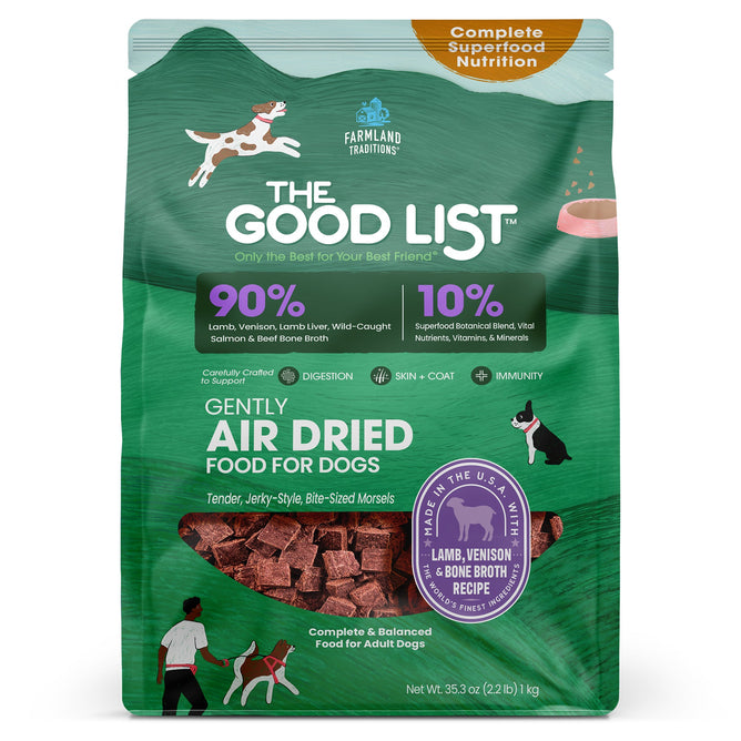 A green bag of The Good List by Farmland Traditions Lamb, Venison & Bone Broth Recipe dog food features premium ingredients—90% animal sources and 10% superfoods—with playful dogs pictured on the packaging.