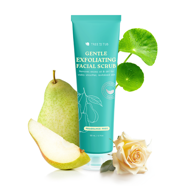 A tube of Tree To Tub Gentle Exfoliating Face Wash & Cleanser rests among a pear, a pear slice, a white rose, and green leaves. This fragrance-free exfoliator, rich in salicylic acid and natural micro-exfoliators, promotes smoother skin.
