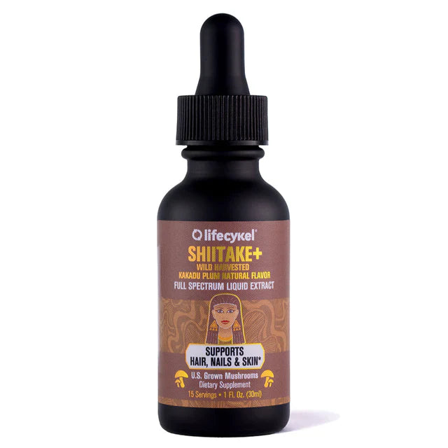 A dark dropper bottle labeled Lifecykel Shiitake+ Liquid Double Extract with Kakadu Plum flavor, designed to support hair, nails, and skin. The label displays mushroom graphics and essential product information.