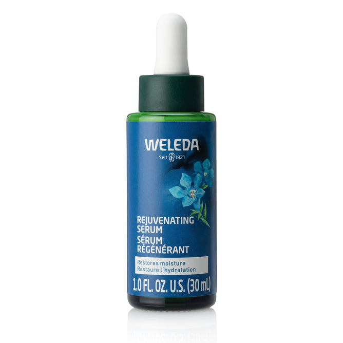 A 30 mL dropper bottle of Weleda Rejuvenating Serum with blue and green label, featuring blue gentian and edelweiss flowers, plus product text in English and French.