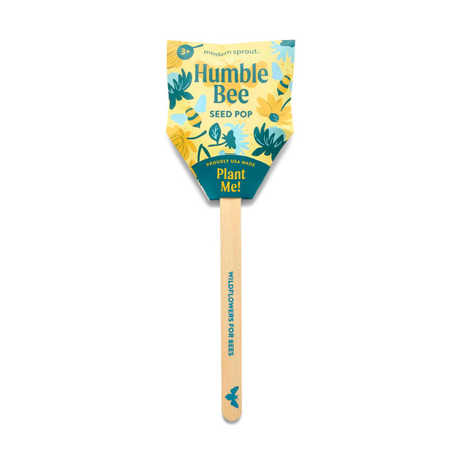 Modern Sprouts Seed Pop is vertically displayed, featuring a yellow-green floral design. The wooden stick reads Wildflowers for Bees, and it promotes family-friendly gardening with organic seeds.
