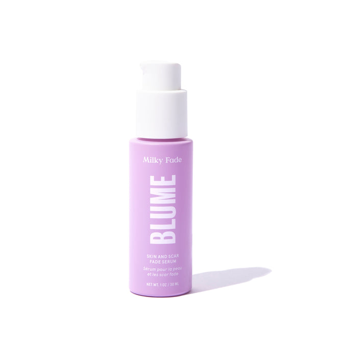 A pink bottle of Blume Skincares Milky Fade Spot and Scar Serum with a white pump contains 1 fl oz (30 ml). The English and French label details this skin-strengthening formula aimed at effectively fading stubborn spots and acne scars.