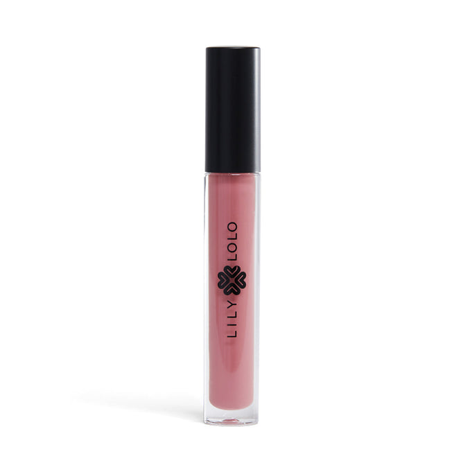 A clear cylindrical tube of Lily Lolo Lip Gloss, paraben-free and in pink, stands upright with a black cap against a white background. Lily Lolo is elegantly printed in black on the tube, highlighting this natural lip gloss.