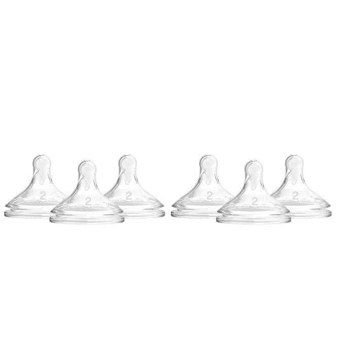 The image displays six Dr. Browns Level 2 Flow Silicone Wide-Neck Nipples, arranged in two rows. Made from 100% silicone, each nipple is designed for medium flow and features an anti-colic vent system, all against a white background.