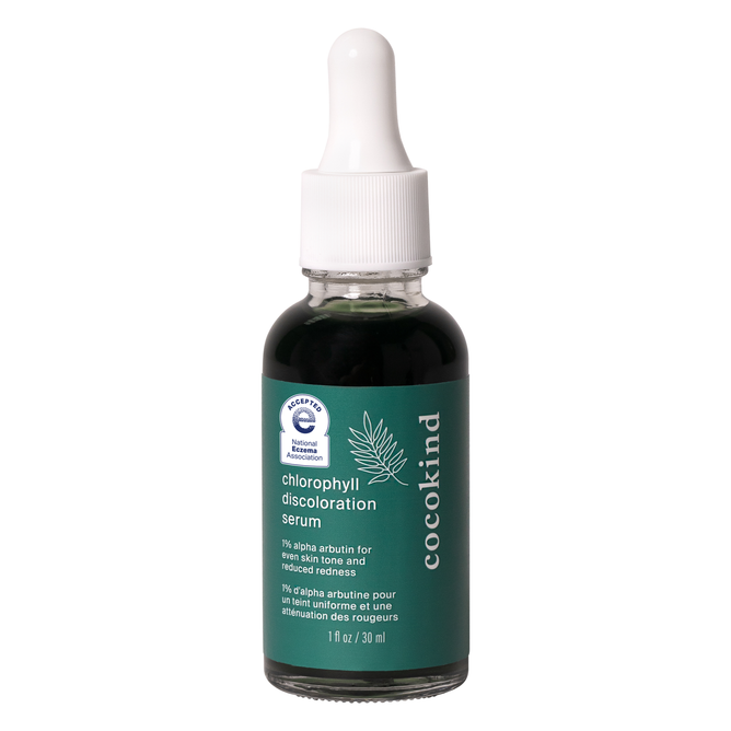 Cocokinds Chlorophyll Discoloration Serum, featuring alpha arbutin and a dropper cap, comes in a 1 fl oz (30 ml) bottle. The green label emphasizes benefits like even skin tone and reduced redness.