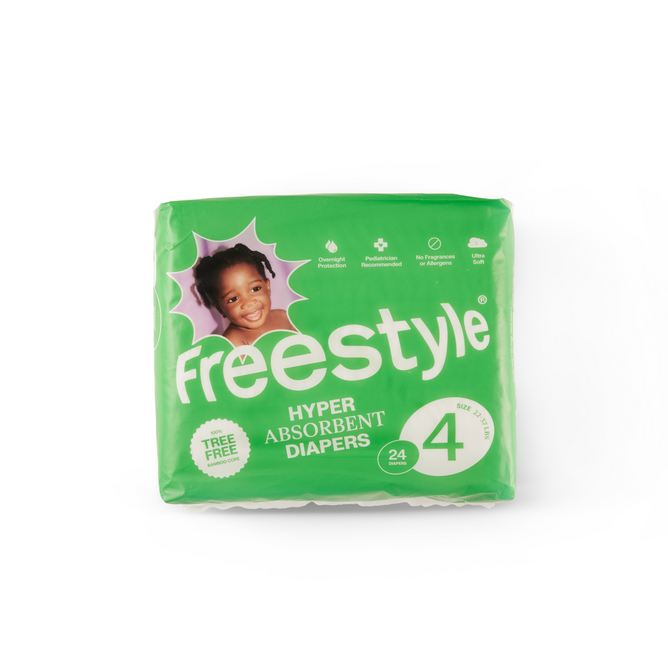 A green pack of Freestyle Tree Free Bamboo size 4 diapers includes 24 eco-friendly, hyper-absorbent, biodegradable pieces. The packaging showcases a smiling child in a starburst design and highlights tree free and no fragrance features.