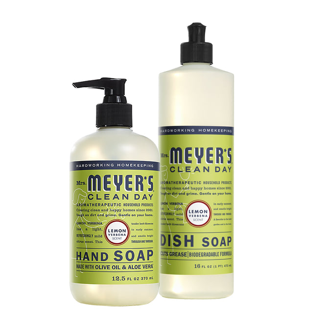 The Hand & Dish Duo from Mrs. Meyers showcases a 12.5 fl oz lemon verbena hand soap with olive oil and aloe vera, next to a refreshing 16 fl oz dish soap. Both are adorned with vibrant green and yellow labels that reflect their lively scent.