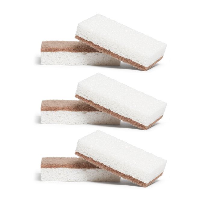 Three Grove Co. Walnut Scrubber Sponges, made from plant-based cellulose, are stacked in pairs on a white background. Each pair features an all-purpose cleaning sponge placed at an angle atop another.