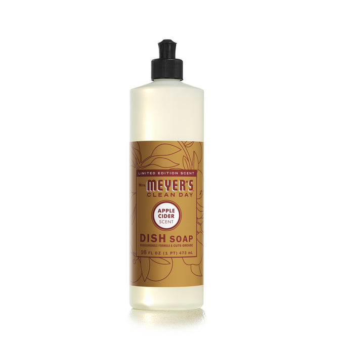 Mrs. Meyers Apple Cider Dish Soap bottle features a floral design on a light background, includes a black dispenser cap, and contains 473 ml (16 fl oz) of soap.