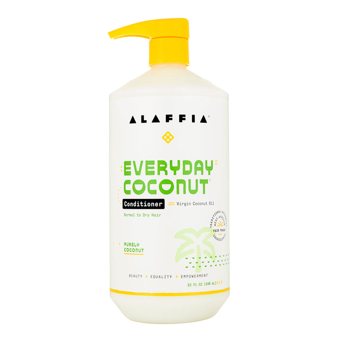 Alaffias Everyday Coconut Conditioner comes in a white bottle with a yellow pump. The label, with green and yellow text, emphasizes virgin coconut oil and natural ingredients for normal to dry hair. A coconut tree drawing is at the bottom.