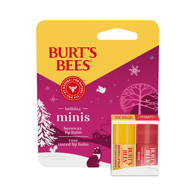 The Burts Bees Mini Lip Balm holiday gift set features two flavors, beeswax and rose tinted, in packaging adorned with a winter scene of snow, trees, and animals on a yellow and purple background, making it an ideal seasonal gift.