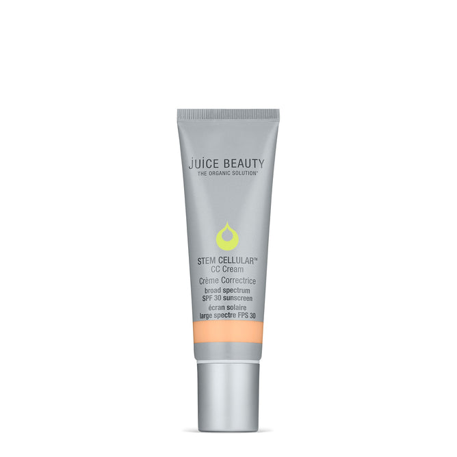 A metallic gray tube of Juice Beautys Stem Cellular CC Cream SPF 30, with green and orange accents, featuring organic mineral zinc sunscreen for broad-spectrum protection, is set against a white background.