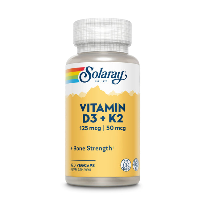A bottle of Solaray Vit D3 + K2 Veg Capsule featuring 125 mcg of Vitamin D3 and 50 mcg of Vitamin K2 for bone strength and calcium absorption. Contains 120 veggie capsules with a yellow background and a colorful stripe design.