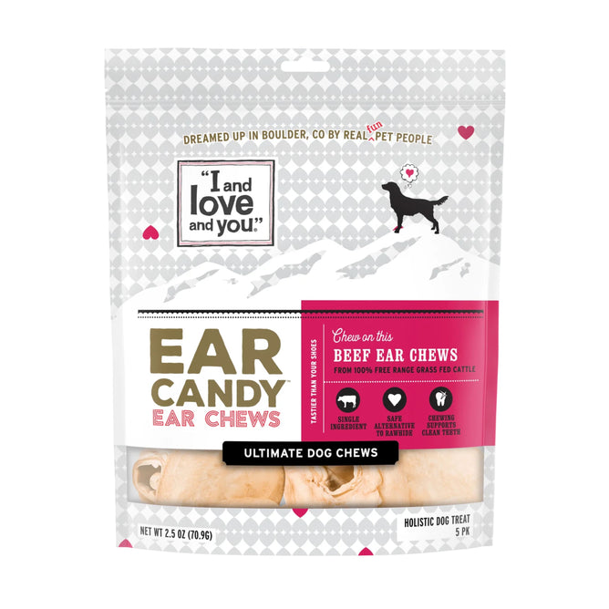 A package of I and Love and You Ear Candy Dog Chews, made from free-range beef with natural ingredients for healthy digestion, clean teeth, and eco-friendly packaging; features a mountain silhouette with a dog image.
