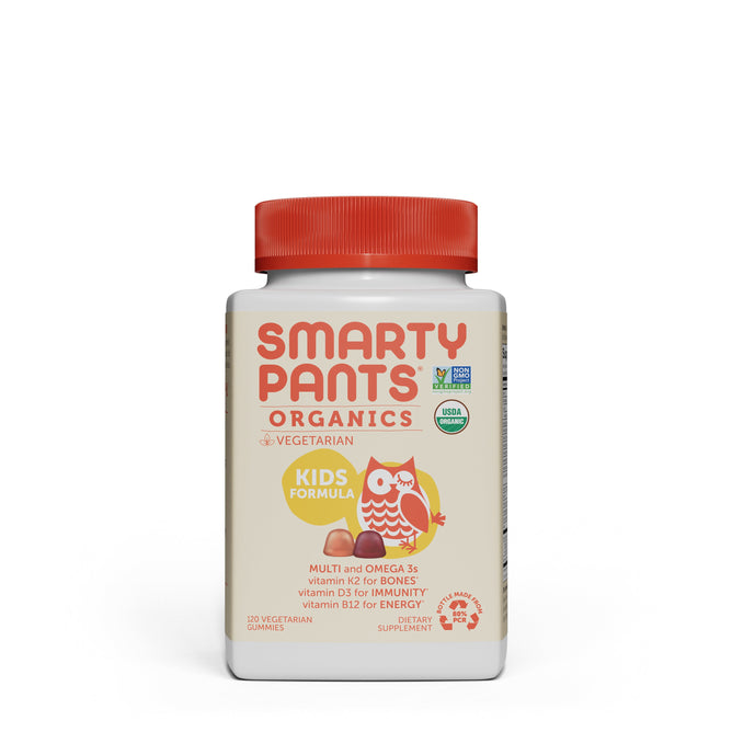 A bottle of SmartyPants Kids Complete Organic gummies showcases an owl and emphasizes Organic Kids Vitamins including K2, D3, and B12. These vegetarian, Non-GMO gummies are USDA organic certified and topped with a vibrant red cap.