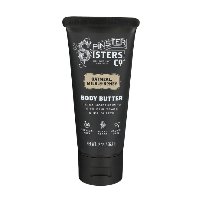 A 2 oz black tube of Spinster Sisters Co. Body Butter in Oatmeal, Milk, and Honey is lavender-infused and features descriptions such as Consciously Crafted, Ultra Moisturizing with Fair Trade Shea Butter, Chemical Free, and Plant Based.