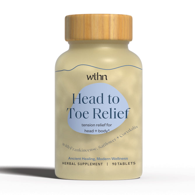 A bottle of WTHNs Head to Toe Relief - Tension Relief for Head + Body herbal supplement has a light beige design, wooden cap, and blue text. It offers tension relief with 90 tablets of Chinese herbs like organic frankincense, safflower, and crystal salts.
