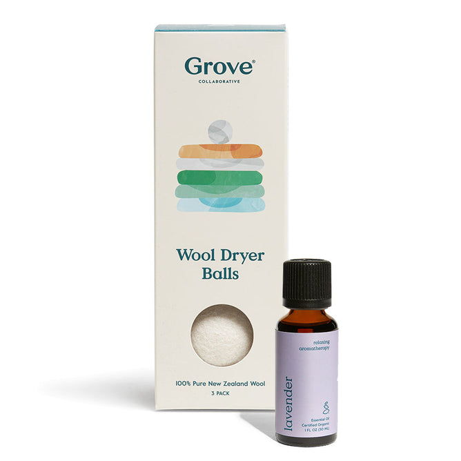 A Grove Co. package of Wool Dryer Balls and 100% Organic Lavender Essential Oil sits together, featuring a tall white box with vibrant designs and a dark oil bottle with a soft lavender label.