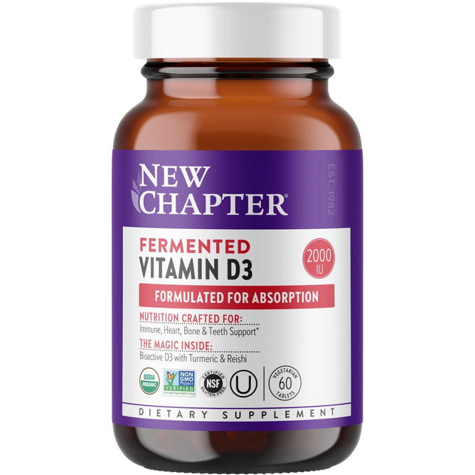 A brown bottle labeled New Chapter Fermented Vitamin D3, 2,000 IU for Immune, Heart & Bone Support (VIP Discount) features a purple, red, and white label highlighting organic vitamin D3 for immune and bone health.