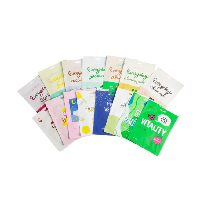 A row of vibrant FaceTory K Beauty Face Mask Set packets showcases unique designs with words like Vitality and Everyday. Infused with concentrated essence, these skincare essentials are a self-care must-have.