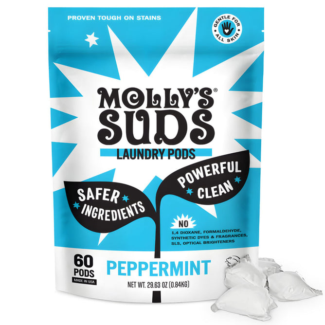 Mollys Suds Laundry Power Pods, Ultra Concentrated in peppermint scent, come in blue and white packaging promoting Safer Ingredients and Powerful Clean. With 60 pods designed for stain removal and sensitive skin, some pods are visible beside the package.