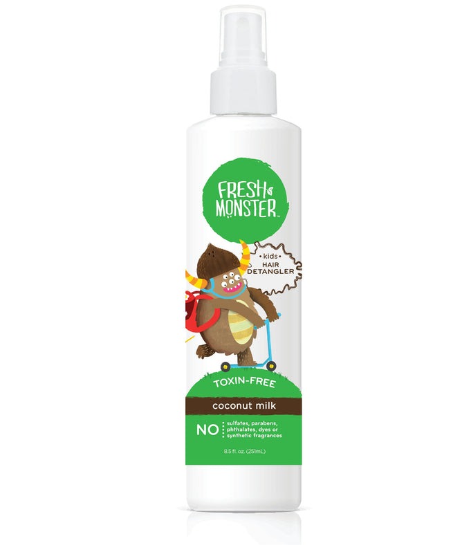 The Detangler Spray for Kids by Fresh Monster comes in a white bottle, featuring a friendly monster in a cape on its label. It boasts a coconut milk scent and is hypoallergenic and free from sulfates, parabens, phthalates, dyes, toxins, and synthetic fragrances.