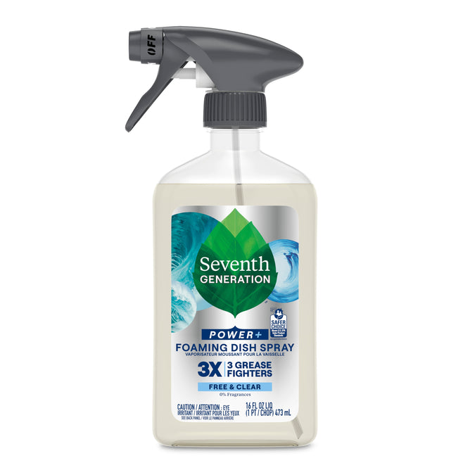 The Seventh Generation Foaming Dish Spray features a gray trigger nozzle with a design of waves and green leaves. The label highlights 3X Grease Fighters, Free & Clear, with foaming action, and states 100% Biodegradable Ingredients. The bottle has a capacity of 16 fl oz.