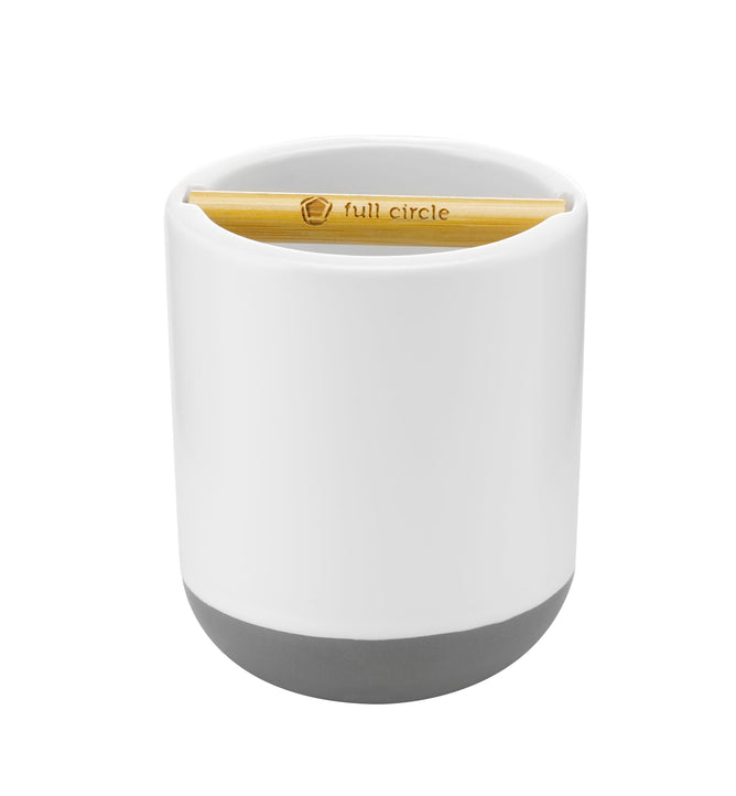 A ceramic countertop compost bin with a bamboo lid displays the full circle logo and reveals a versatile bamboo divider inside.