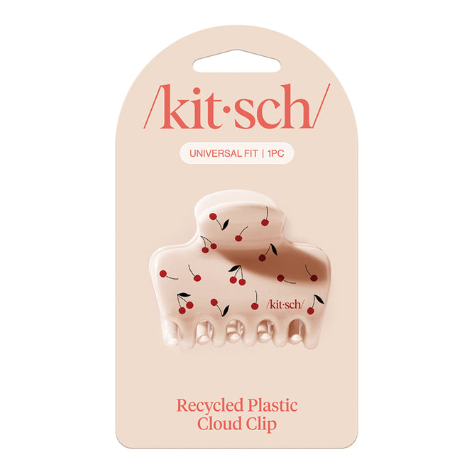 The Kitsch Recycled Plastic Medium Cloud Clip is a kitsch hair accessory featuring a cherry pattern, made from recycled plastic to provide a universal fit.