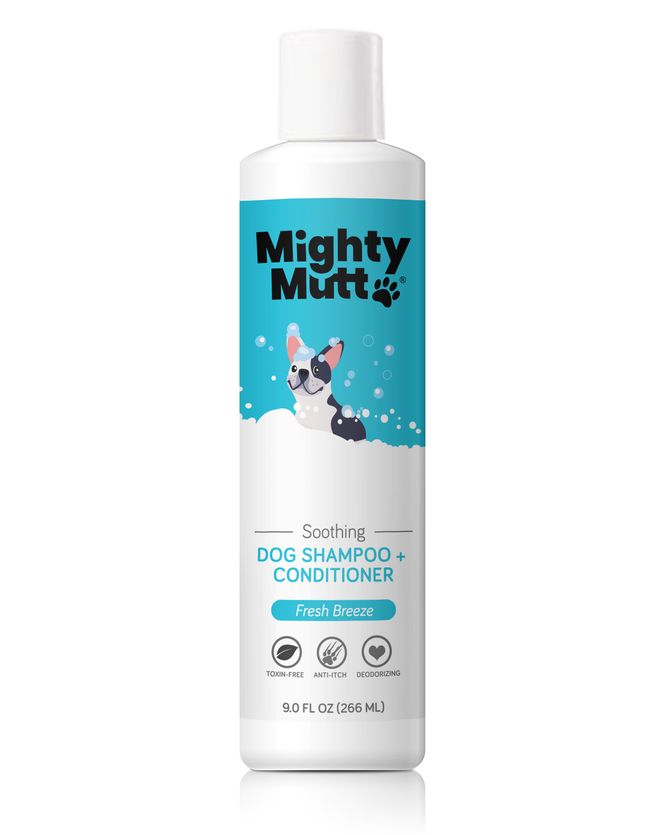 A 9 oz white bottle of Mighty Mutt Dog Shampoo and Conditioner, Fresh Breeze, showcases a cartoon dog with bubbles. This eco-friendly hypoallergenic formula is toxin-free, anti-itch, and deodorizing.